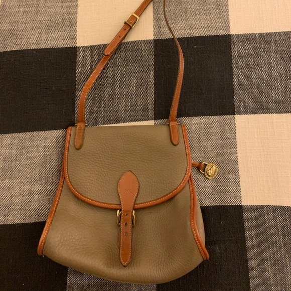 Dooney & Bourke Handbags - Dooney & bourke vintage saddle bag belt closure